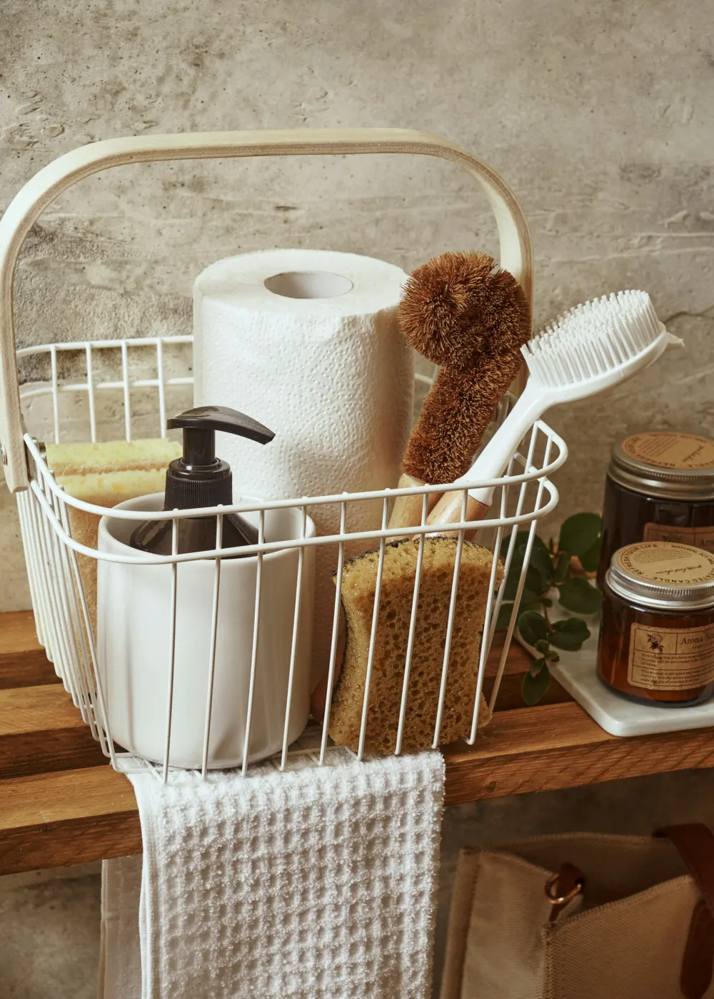 Wire caddy with brushes and a kitchen roll