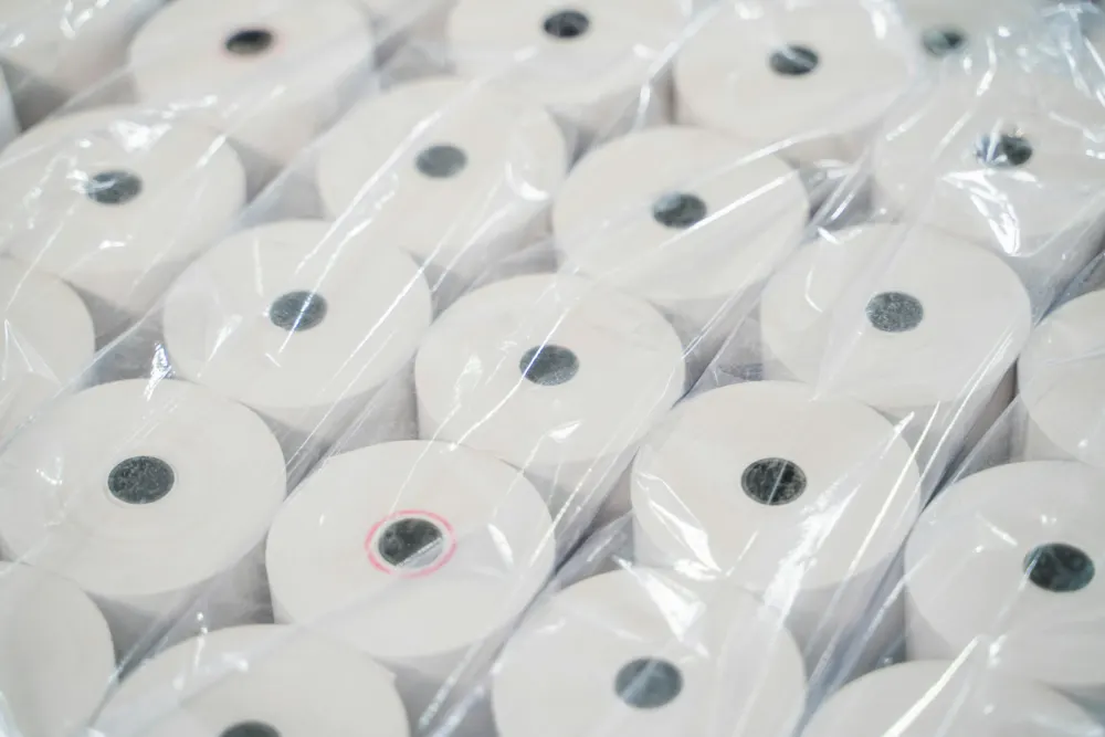 Wrapped toilet rolls in a case